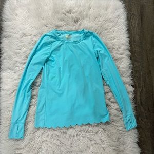 Lilly Pulitzer. Blue, scalloped, Luxletic, long sleeved top. Size XS